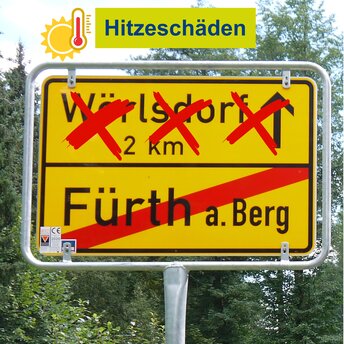 Ein Hinweisschild, bei dem das Fahrziel Wörlsdorf durchgekreuzt ist.